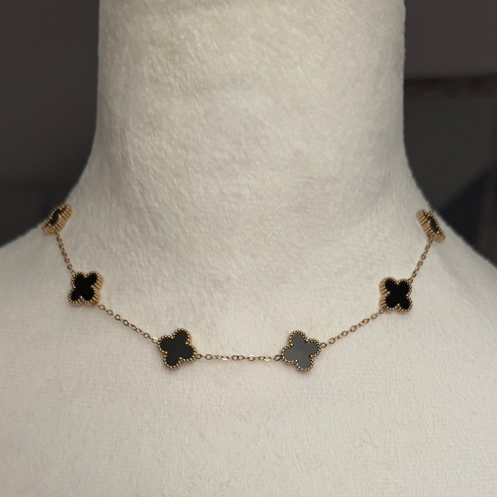 Elegant Gold and Black Clover Necklace